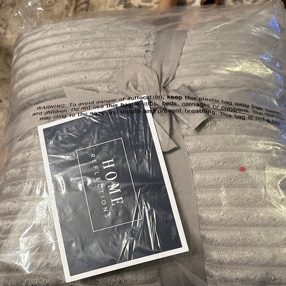 Two Silver/Gray Pillows
